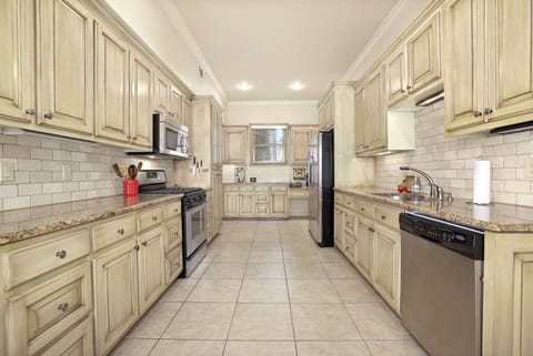 Kitchen area, stove and micro on the left, fridge and dishwasher on the right.