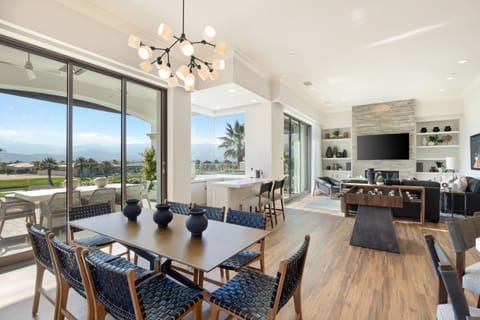 Great room includes dining table with seating for 8