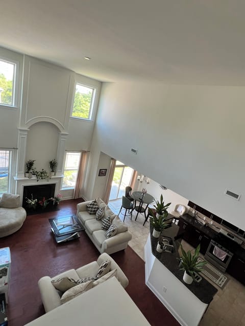You are looking at Living Room and Kitchen Downstairs view from Upstairs 