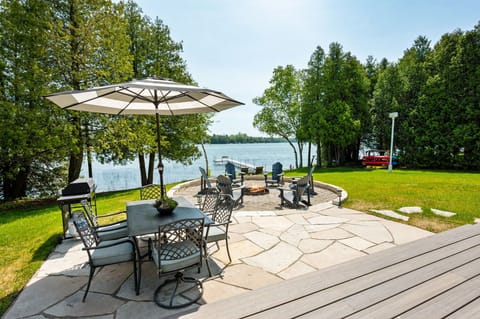 Enjoy our lakeside deck, patio, and entertainment space.