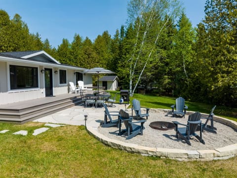 Chicory Lake House is a wonderful lakefront escape.  While our home is close to the causeway, a thick grove of trees provides privacy.