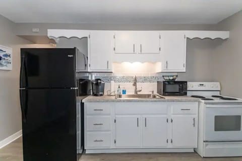 This suite has a full kitchen.