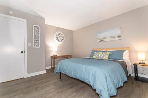 Beautifully designed bedroom in this amazing suite. Let your stress melt away!