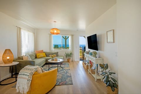 Take in ocean view as you relax on a comfortable couch