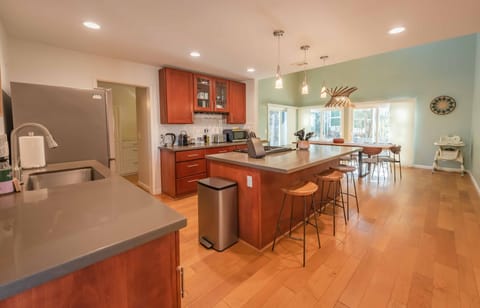 Kitchen with island and barstools