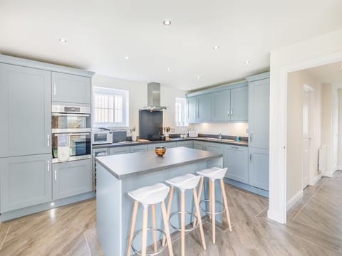 Kitchen with Island and Chairs