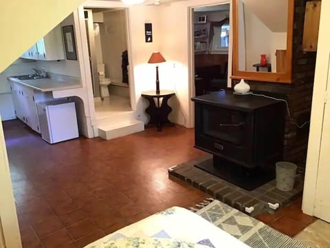 Looking from bedroom 3 to bathroom 2 and living room 2 through doorway 