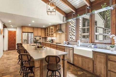 Culinary Excellence:
Our fully stocked kitchen is a testament to our commitment to your exceptional stay. It offers an array of utensils and equipment, allowing you to indulge in the art of cooking in a space that feels like home.