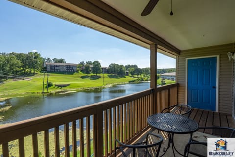 Covered Porch with a View of the Pond