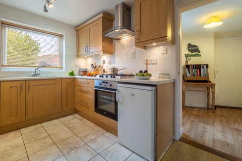 Ground floor: Kitchen leading to sitting room