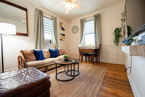 Living Room: Sunlit retreat with chic decor, perfect for relaxation and meals with a view!