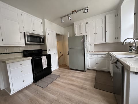 Kitchen with utensils & pantry supplies 