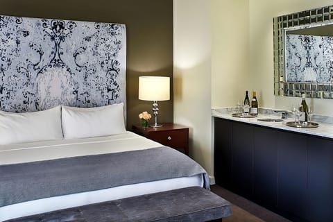 Relax in a sun-washed king room with elegant lounge seating.