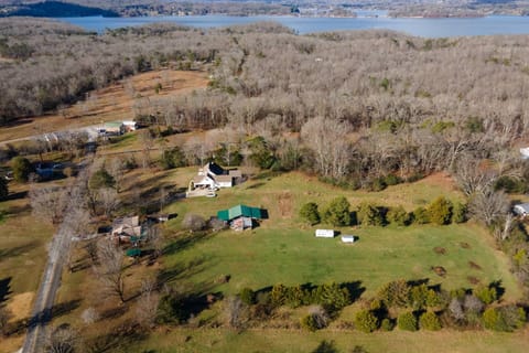 Large private property with stocked pond and less than 1/4 mile to Harrison Bay State Park