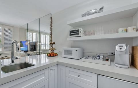 kitchenette for light cooking.  coffee maker, fridge, micro, toaster, hot plate