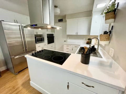 Upstairs main kitchen with all new stainless steel appliances