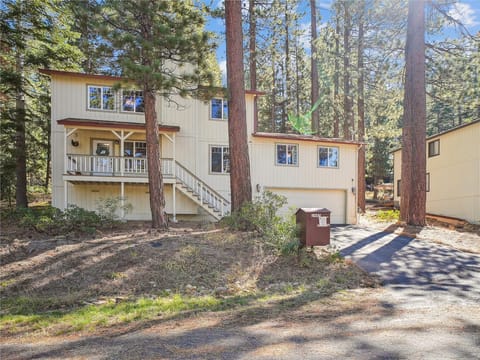 Charming mountain cabin nestled in serene pine woods, perfect for a peaceful retreat.