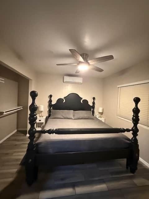King size bed with night stands and HVAC