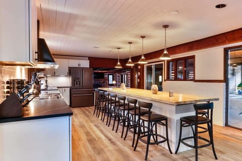 15-foot long island table that seats 16