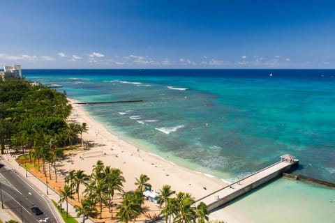 Soak in endless turquoise views just steps from the sand.