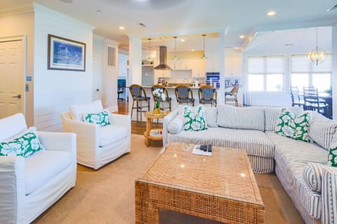 There is an open floor plan layout between the living room, dining area and kitchen.