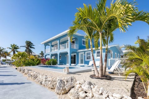 Experience the beauty of a well-appointed outdoor living space, offering the perfect setting to relish the fantastic weather of the Florida Keys at Bl