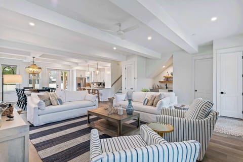 High end furnishings with a relaxed coastal charm make the space inviting for everyone!