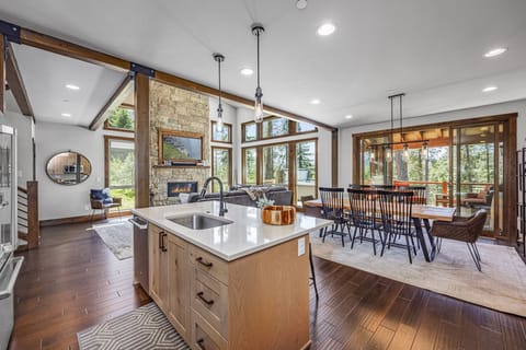 Experience the perfect blend of elegance and comfort in this high-end mountain kitchen