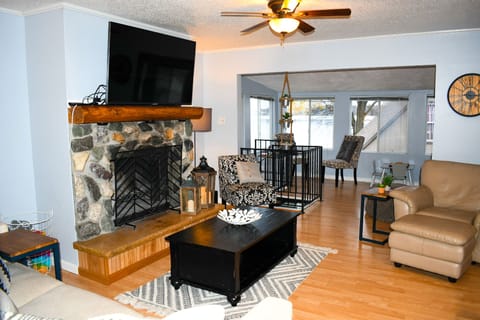 View from hallway to livingroom and lakeside windows