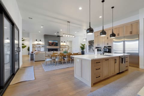 Full View of Gathering Place - This beautiful home has large open floor plan with lots of comfortable seating and a beautiful view with it's large windows. It is a great gathering place for large families or multiple guests.