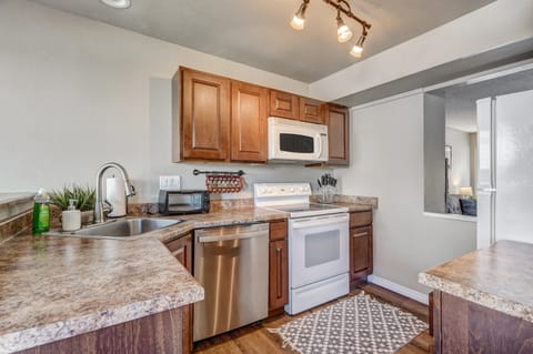 Well-equipped kitchen with modern appliances and plenty of counter space, ready for preparing your favorite meals.
