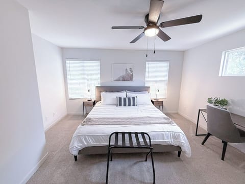 Discover the Cozy and Spacious Second Bedroom Upstairs with a King Bed. 