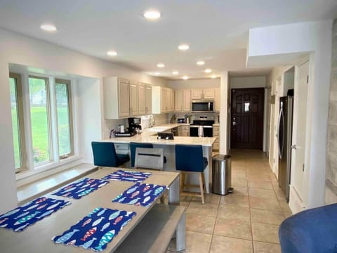 Kitchen and dining table that seats 10-12