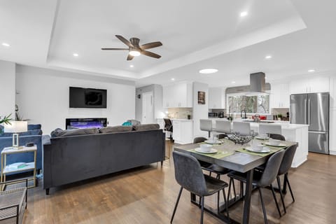 Open room with LR / Dining / Office Space & Kitchen w/TV - Main House