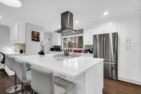 Open room with LR / Dining / Office Space & Kitchen w/TV - Main House