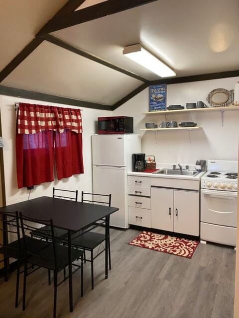 Full kitchen and seating area