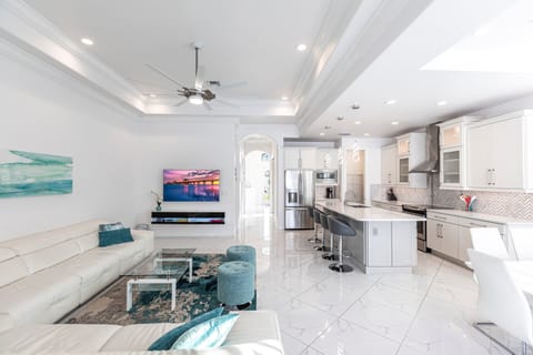 Large living area with plenty of seating and formal dining