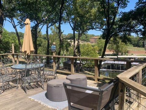 500 sq ft deck with plenty of seating.  Propane grill and flat top.