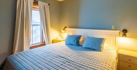 Relax and recharge in this comfortable bedroom.