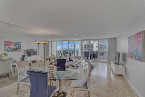Dining area for 4, living room, Roku streaming tv, balcony access