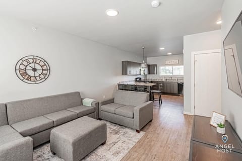 The sitting area with a wall-mounted Smart TV