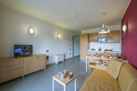 living room with kitchen and dining table view