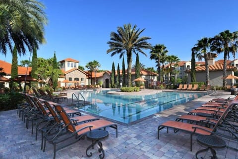Discover serenity in your community's refreshing pool oasis, complemented by an inviting sitting area.