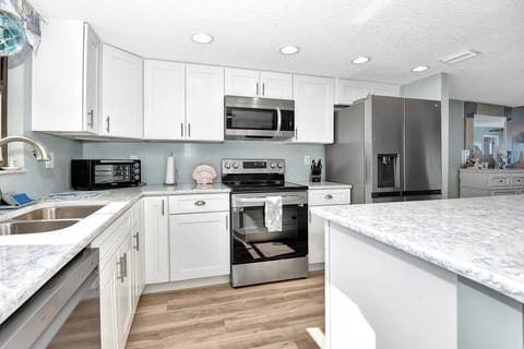 New Kitchen with Cambria quatrz counters, stainless appliances and ocean views