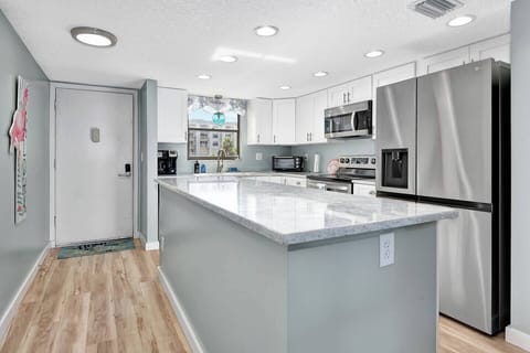 Kitchen with Island and stainless appliances!
