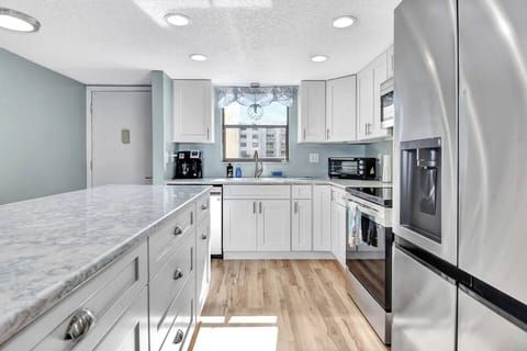 Kitchen with Cambria Quartz counters stainess appliances and all new cabinetry!