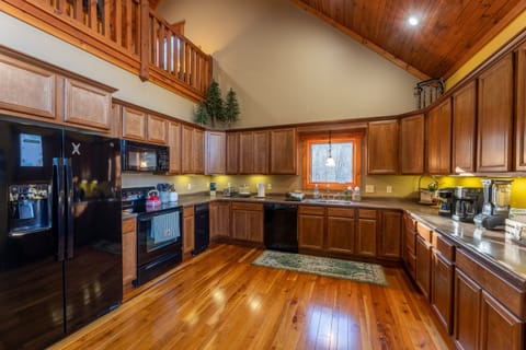 Cook meals in either of the fully-stocked kitchens