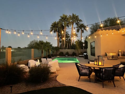 Gorgeous outdoor living with dining space, grill and fire pits.