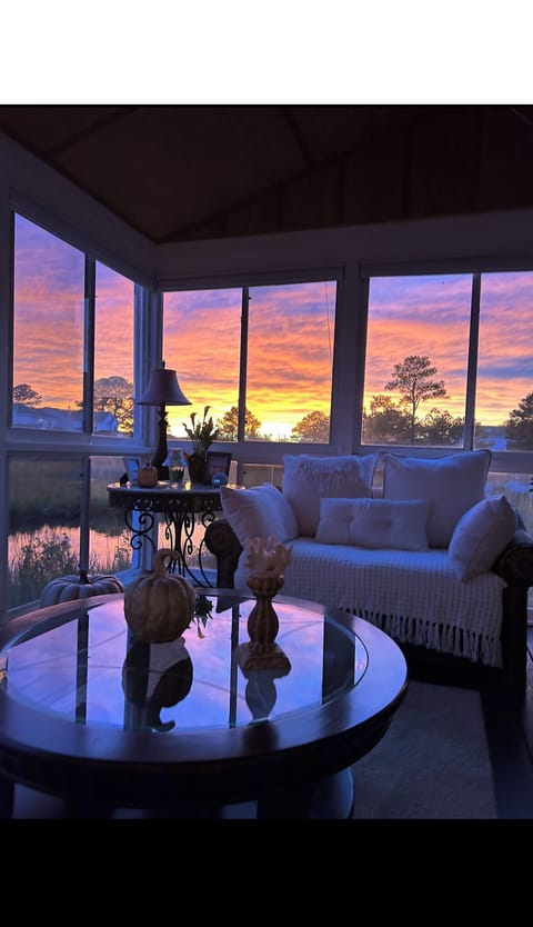 Enjoy beautiful sunsets on the water as you sit in my lovely vacation home