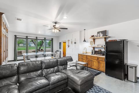 Bright, downstairs living room- great for putting on the game! 